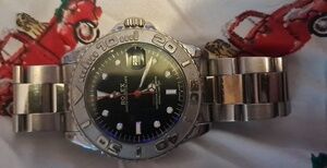 Rolex Silver Watch with Black Dial